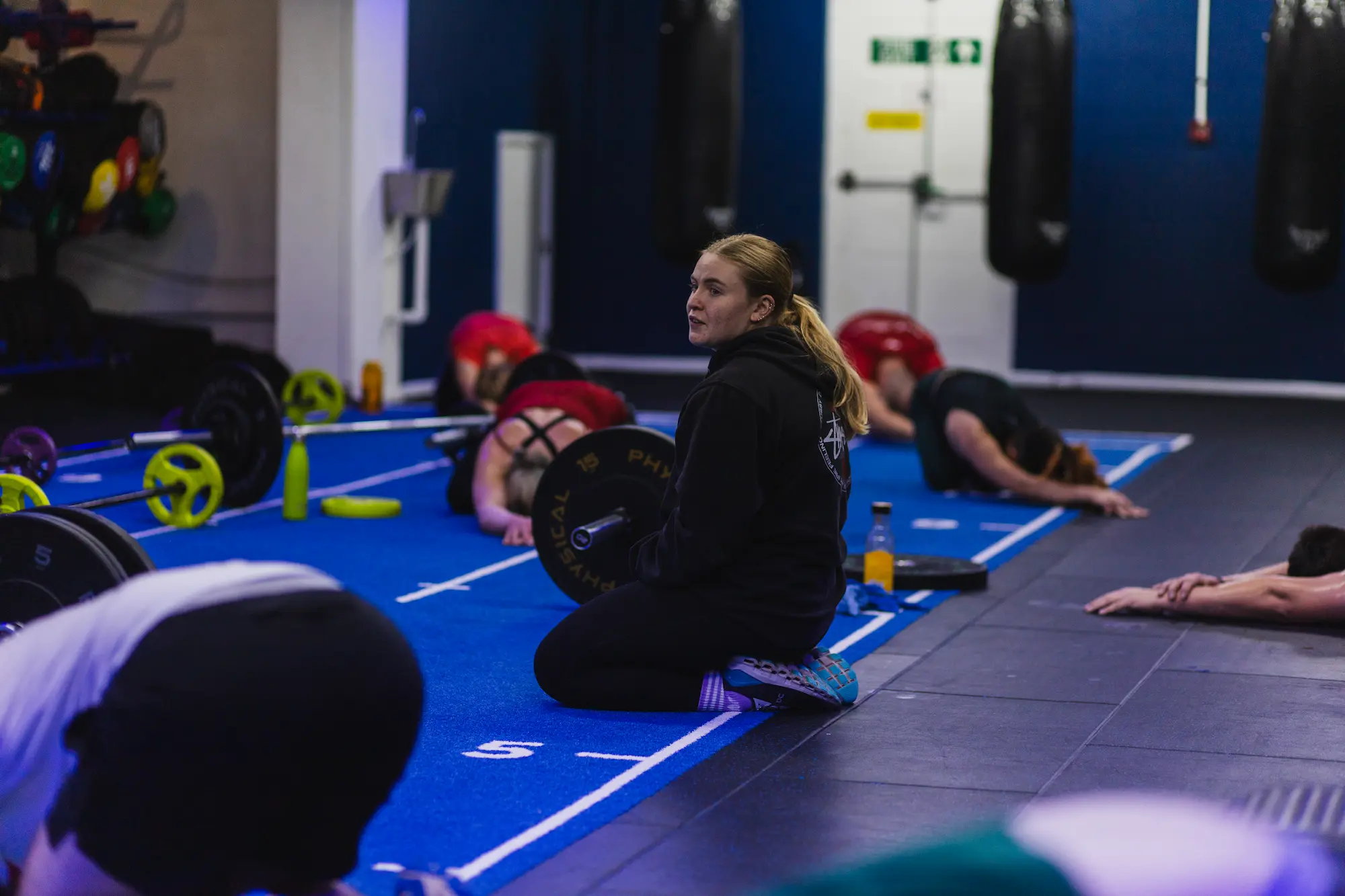 Woman looking at camera in gym